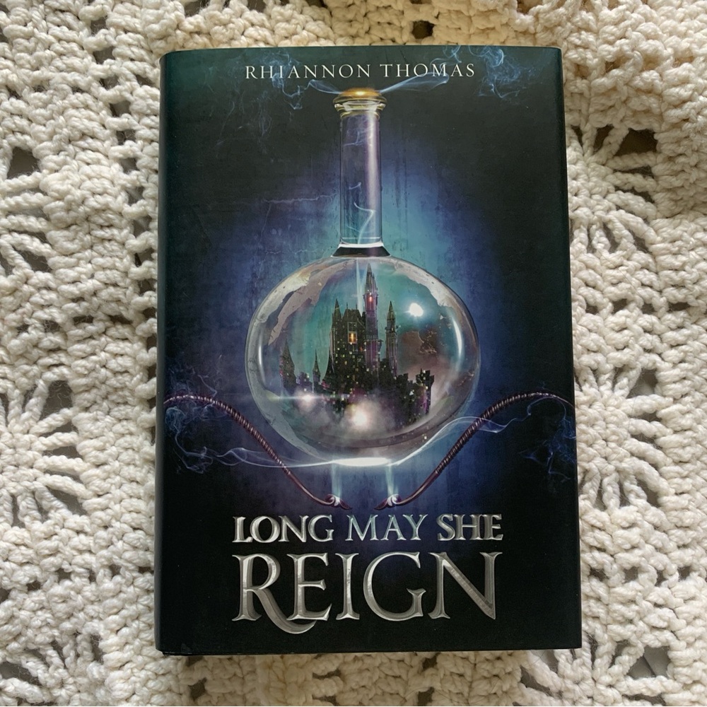 Long May She Reign by Rhiannon Thomas | Hardback | Used Book:Very Good Condition